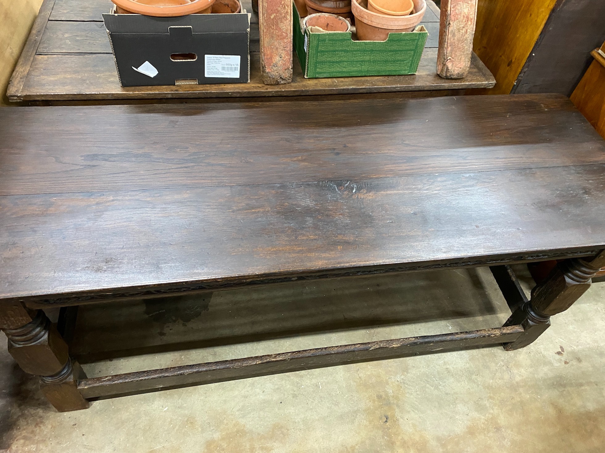A 17th / 18th century rectangular oak refectory dining table with later planked top, width 190cm, depth 67cm, height 70cm *Please note the sale commences at 9am.